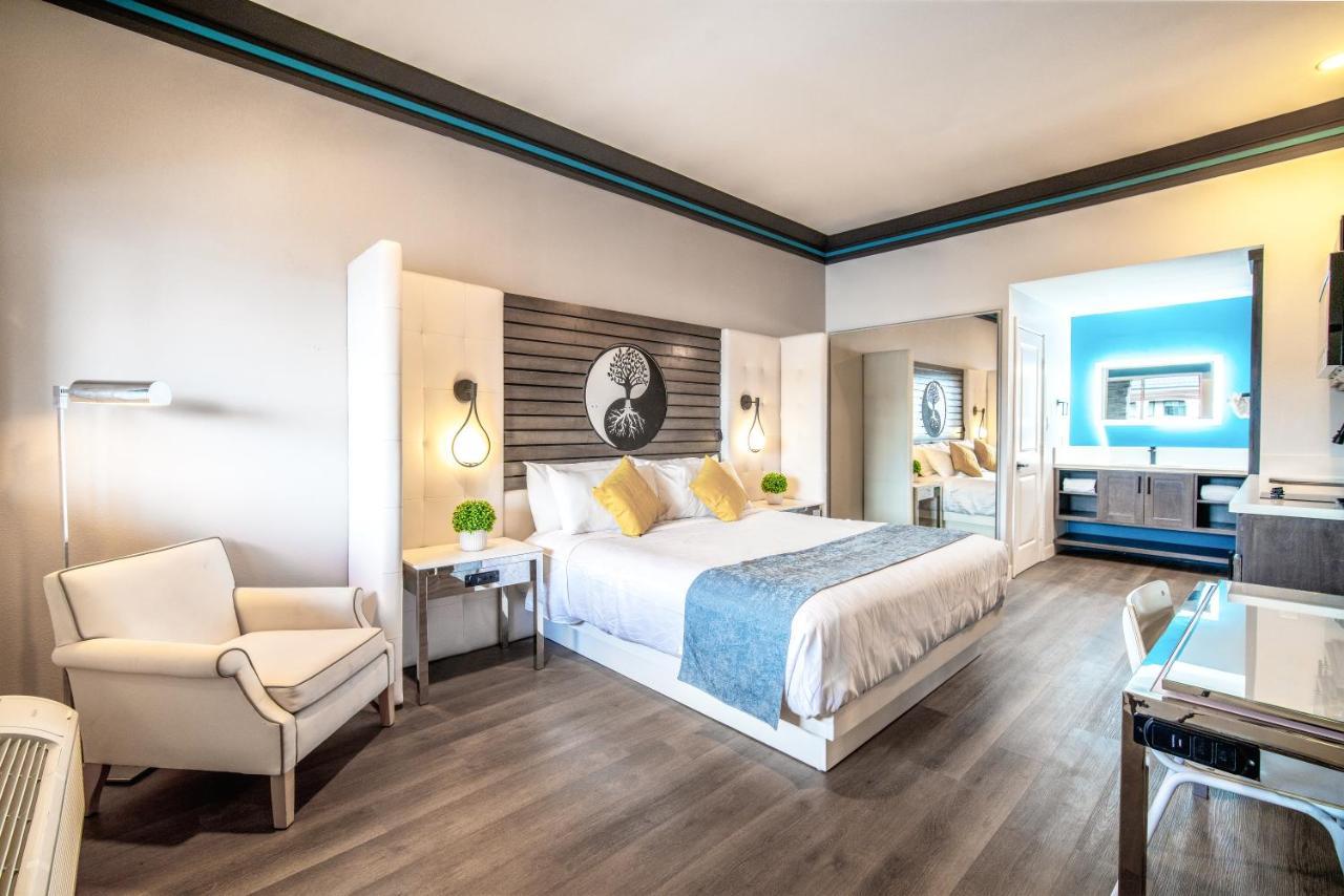 Aspire Inn Studios & Spas Белфлауър Екстериор снимка