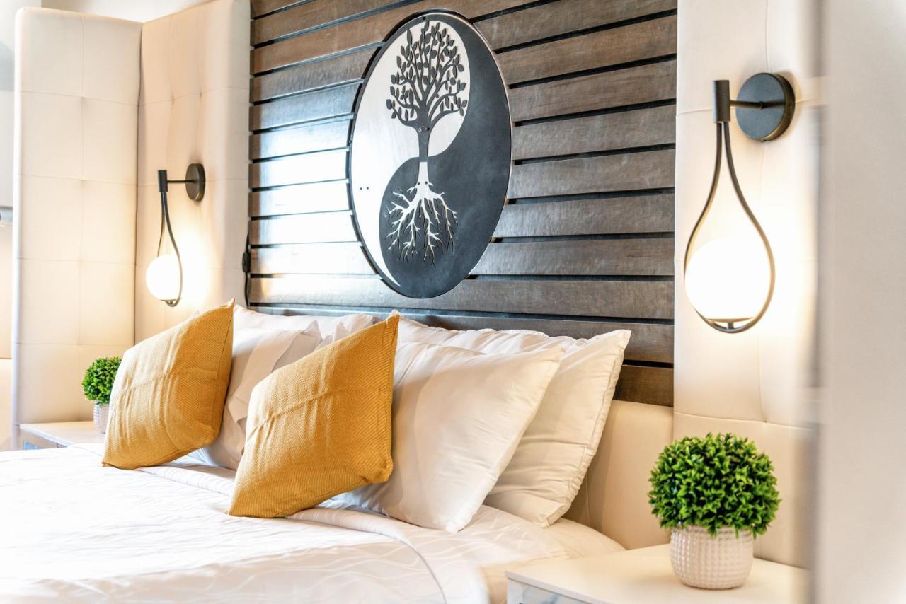 Aspire Inn Studios & Spas Белфлауър Екстериор снимка