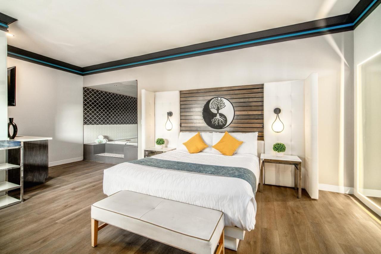 Aspire Inn Studios & Spas Белфлауър Екстериор снимка