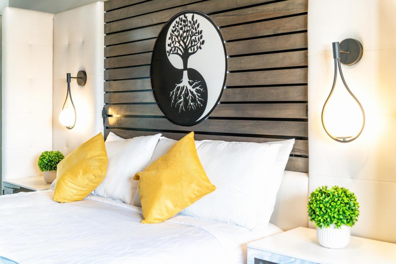 Aspire Inn Studios & Spas Белфлауър Екстериор снимка