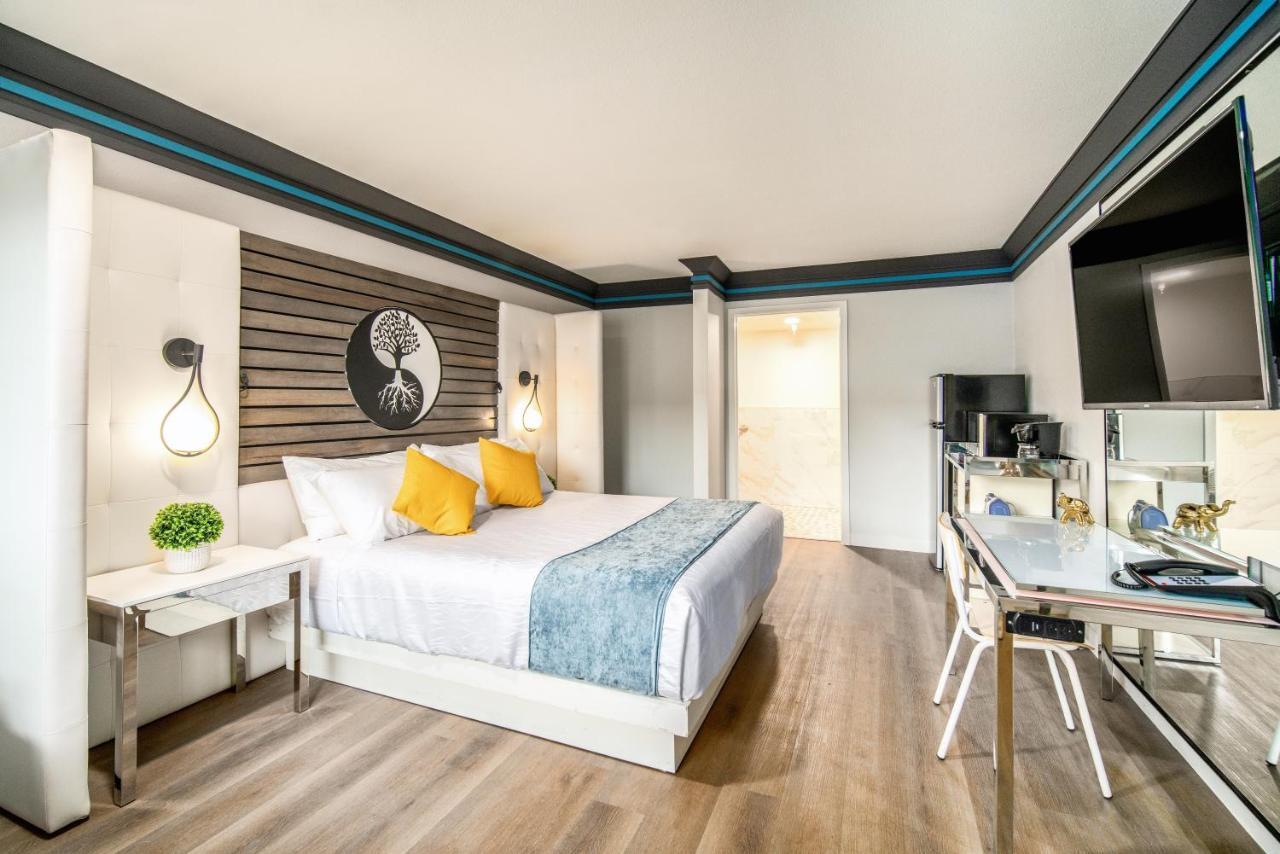 Aspire Inn Studios & Spas Белфлауър Екстериор снимка